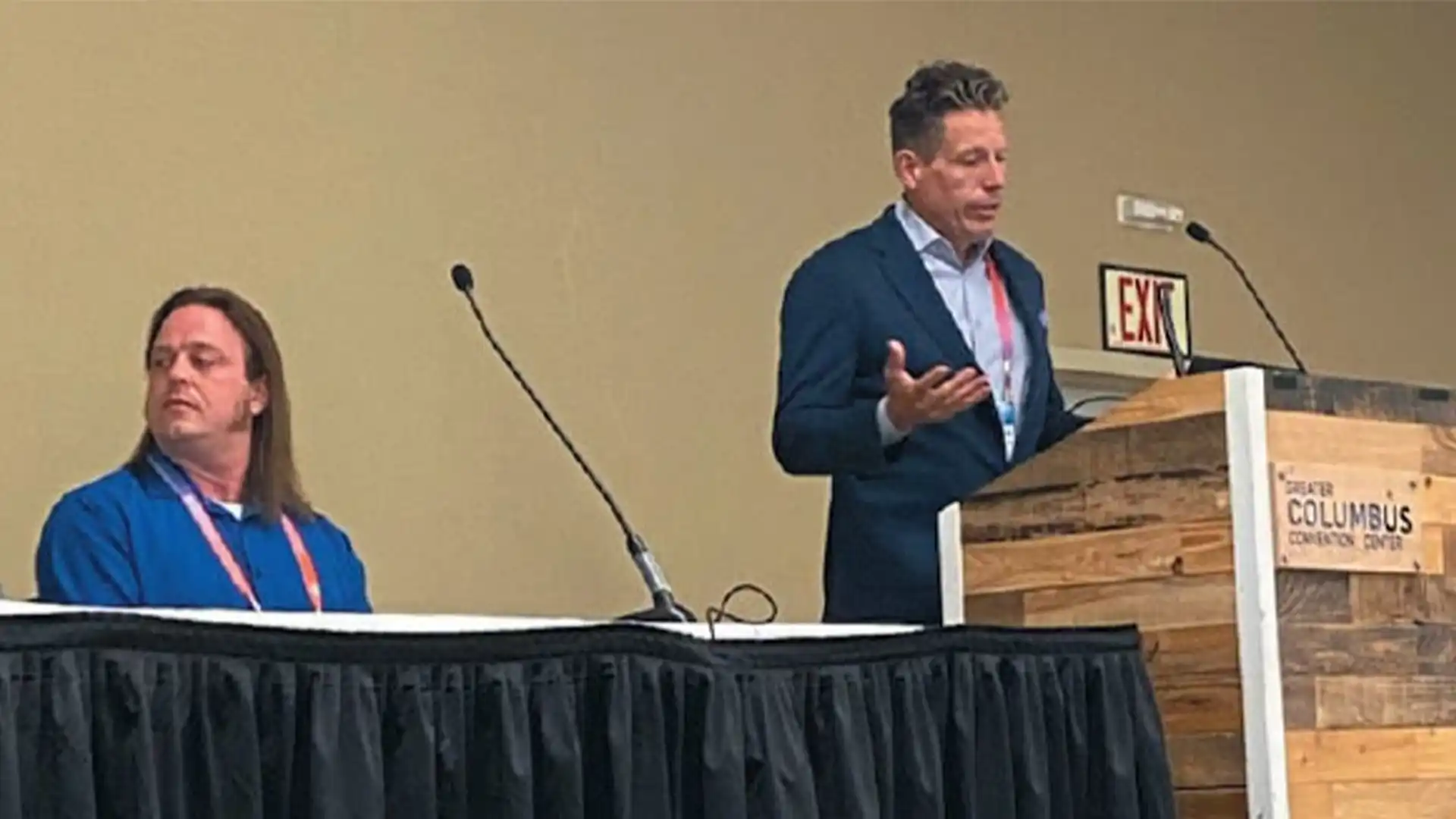 ECS President speaking about AI-powered camera technology for improving safety in paper mills.